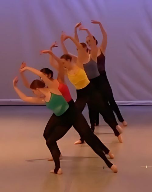 Modern ballet dancers finishing a dance
